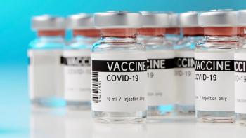ampoules with Covid-19 vaccine on a laboratory bench. to fight the coronavirus / sars-cov-2 pandemic. | Image Credit: ©M.Rode-Foto - Stock.adobe.com