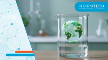 Sustainable eco concept with green globe floating in clear glass beaker symbolizing healthcare and pharma innovation for better future | Image Credit: ©newlifestock -stock.adobe.com