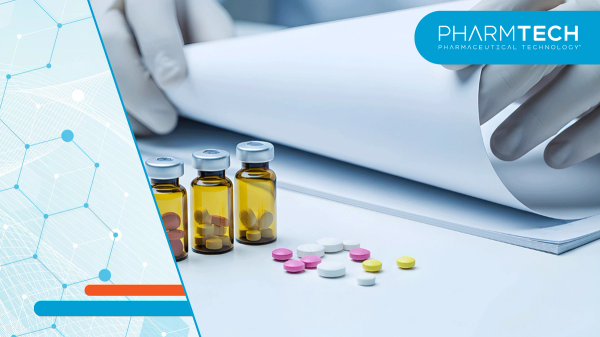 Scientist Examining Medical Documents Near Ampoules and Pills | Image Credit: ©PixelPulse-stock.adobe.com