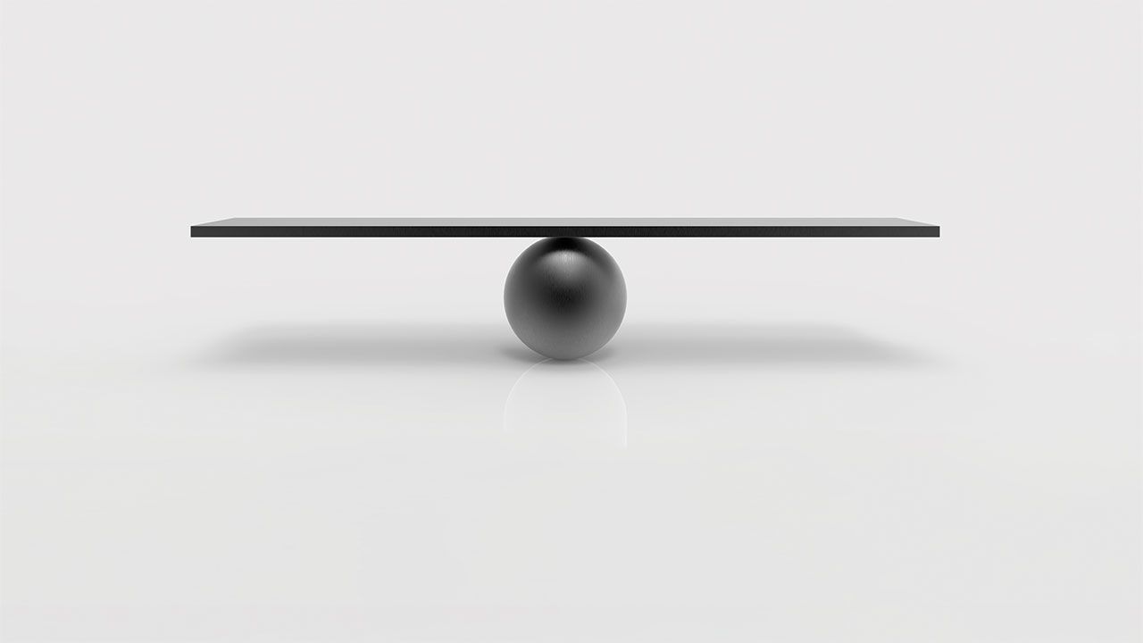 3d rendering. Empty blank black metal sphere balance scale on white background. | Image Credit: ©PATARA – stock.adobe.com