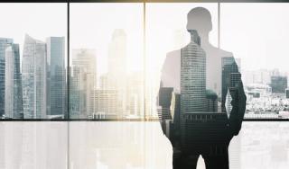 silhouette of business man over office background | Image Credit: © Syda Productions - stock.adobe.com