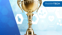 Medical award concept, winner cup on the desk | Image Credit: ©BillionPhotos.com -stock.adobe.com