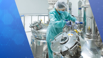 Pharmaceutical factory woman worker in protective clothing operating production line in sterile environment | Image Credit: ©Ivan Traimak -stock.adobe.com. Background: Canva