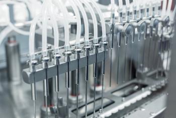 Automatic machine for filling ampoules and vials. Modern pharmaceutical equipment. | Image Credit: © nordroden - stock.adobe.com