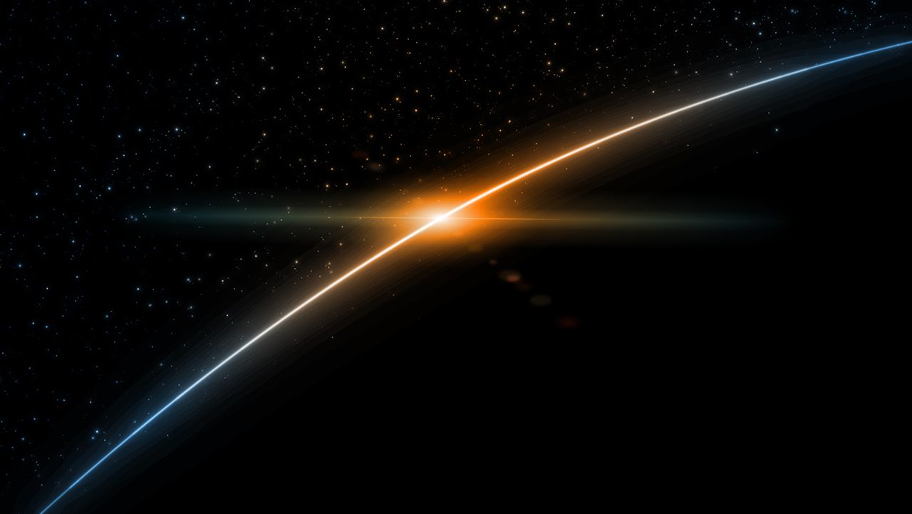 3D Rendering of earth from space with run rising and ray light flare at horizon among glowing stars in galaxy. For wallpaper, sci fi, science or technology background | Image Credit: © knssr – Stock.adobe.com