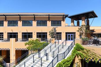 IRVINE, CALIFORNIA - 16 APRIL 2020: Student Center and Visitor Center Building on the campus of the University of California Irvine, UCI. | Image Credit: © Steve Cukrov - stock.adobe.com