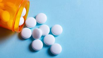 White pills on blue background | Image Credit: © neirfy - © neirfy - stock.adobe.com