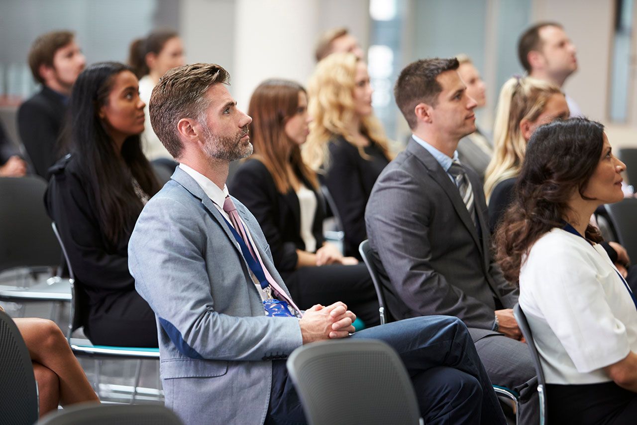 Audience Listening To Speaker At Conference Presentation | Image Source: ©Monkey Business -stock.adobe.com