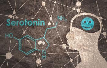 Chemical molecular formula hormone serotonin. Silhouette of a man head. Connected lines with dots background. | Image Credit: © JEGAS RA - stock.adobe.com