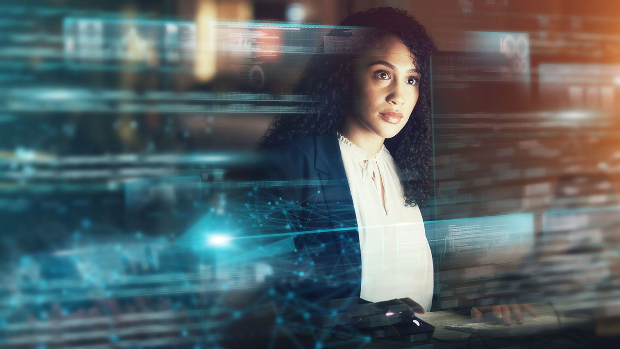 Futuristic, AI and business woman, cyber data and connectivity, iot overlay and technology innovation. Digital transformation, tech analytics and mockup space, web dashboard and internet holographic | Image credit: © Angelo/peopleimages.com – stock.adobe.com