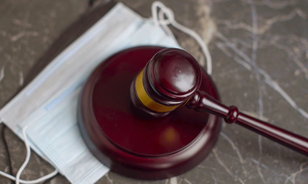 gavel and surgical mask 