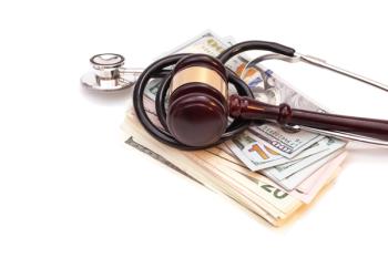 gavel and stethoscope on money | © yurchello108 - stock.adobe.com