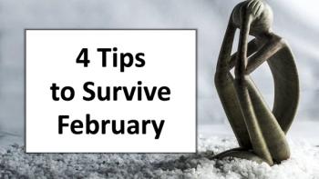 sad figure grabbing head