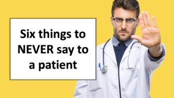 doctor with palm raised in stopping gesture