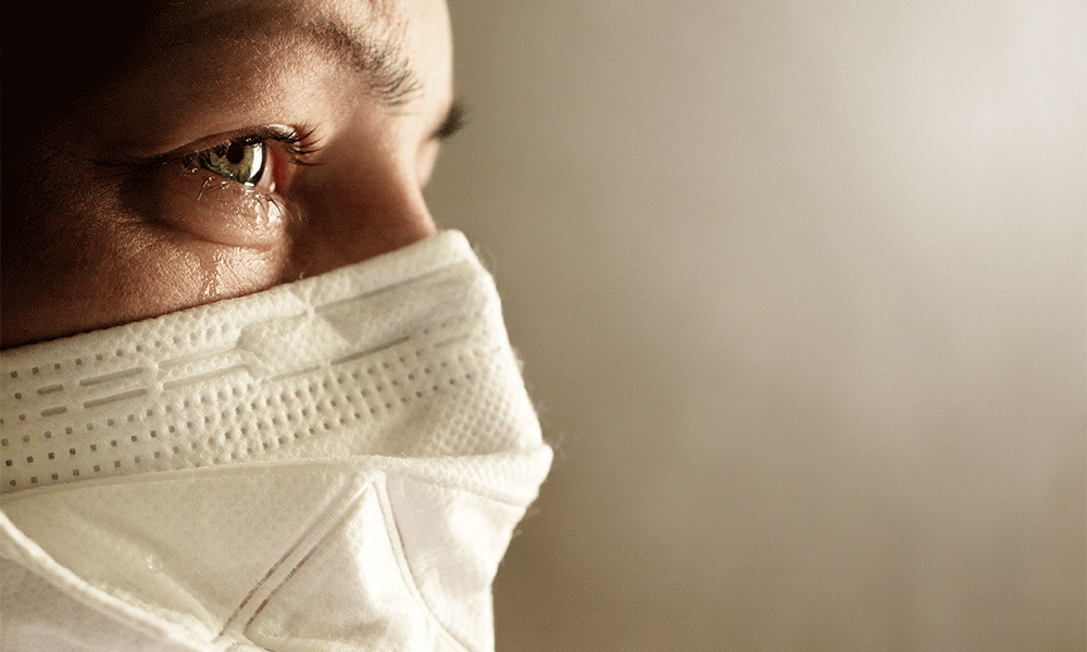 scared patient wearing mask 