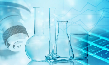 microscope chemical bottles and MacBook