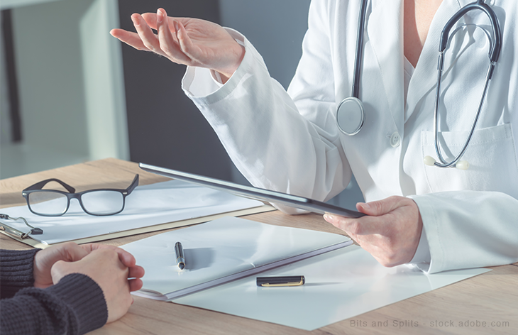 doctor advising patient
