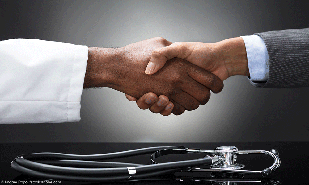doctor business man shaking hands