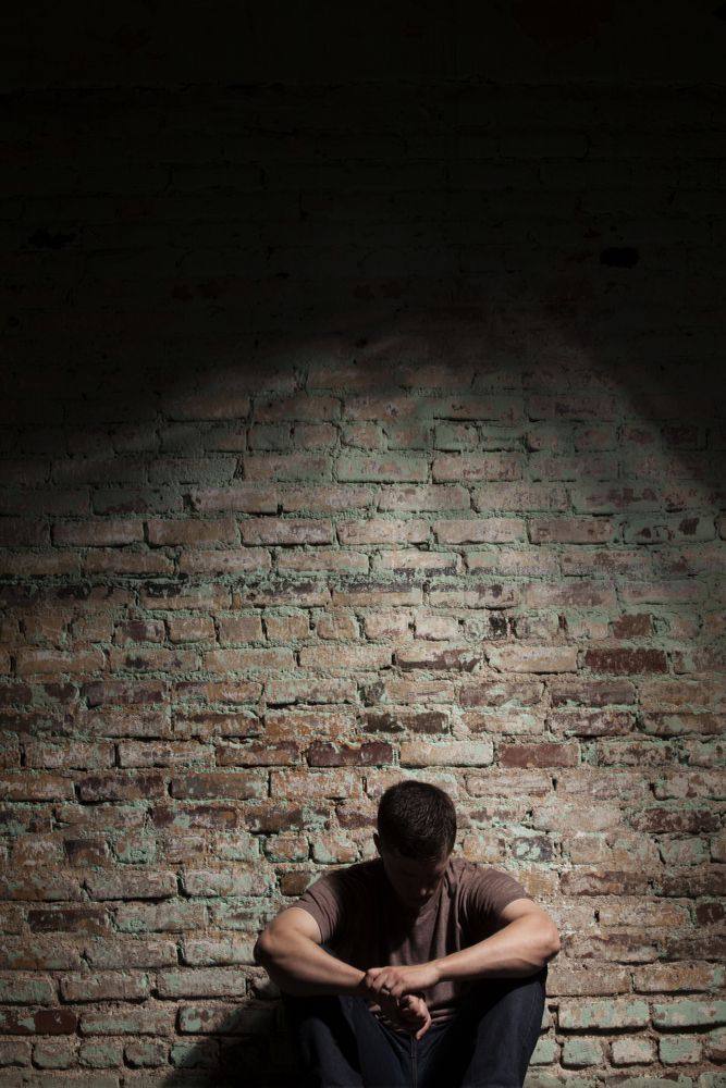 How does isolation affect incarcerated individuals and the broader society?