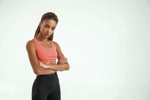 How is the fetishization of Black bodies and the weaponization of European beauty standards used against Black women in sport?