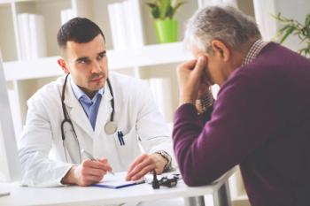 Doctor talking to upset patient | Credit: Fotolia
