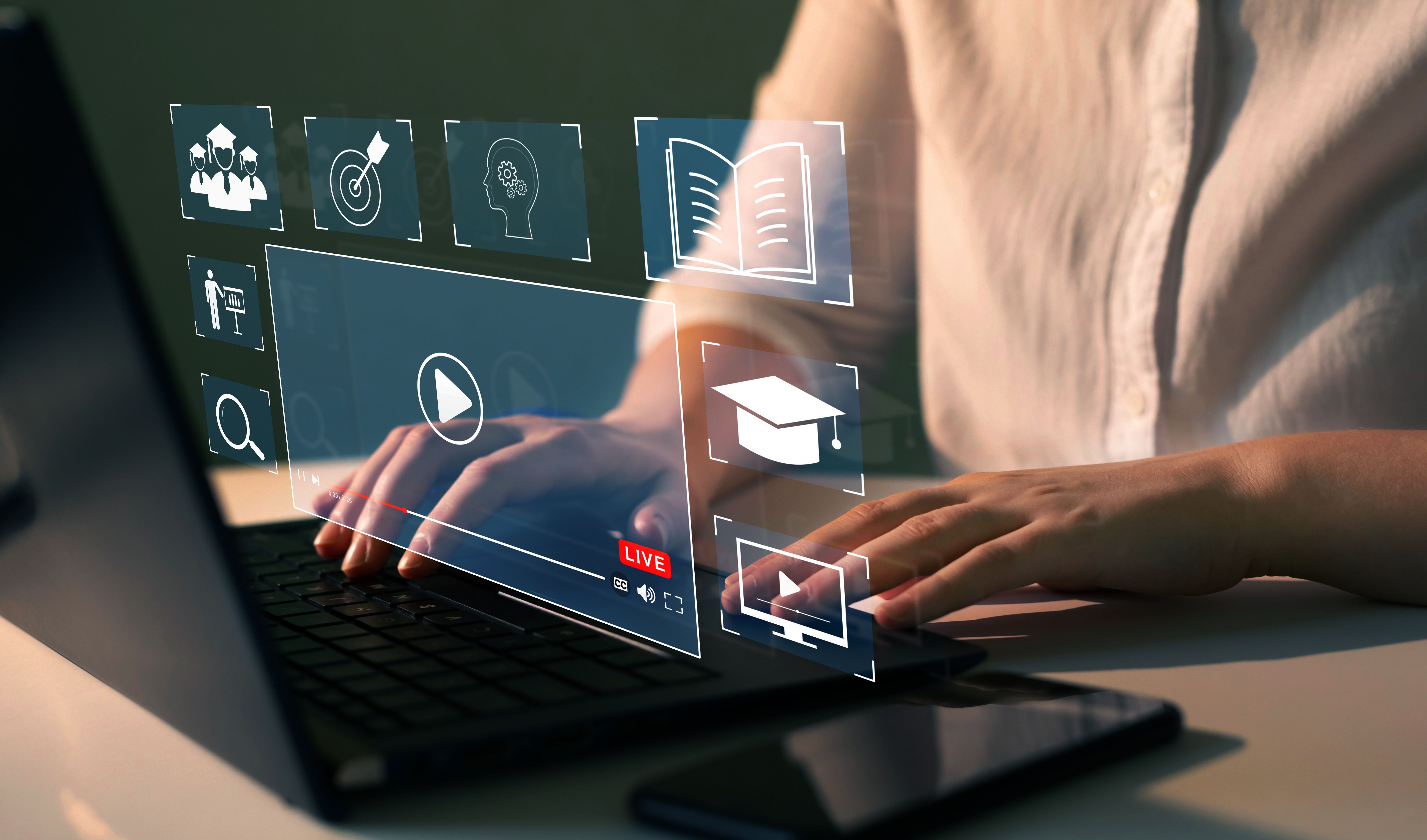 Person who attends online lessons on a digital screen. E-learning education, internet lessons and online webinar. Education internet Technology. | Image Credit: © Miha Creative - stock.adobe.com