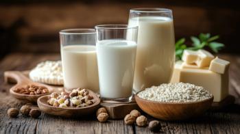 Plant-based milk options like almond soy and coconut emphasizing the trend of choosing vegan dairy alternatives for a more sustainable and health-focused lifestyle. | Image Credit: © CinimaticWorks - stock.adobe.com.