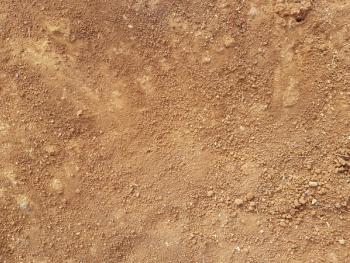 Red Dirt road texture. Soil background. | Image Credit: © Darcraft - stock.adobe.com