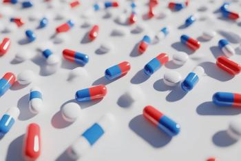 A collection of colorful capsules and tablets scattered on a surface. Generated by AI. | Image Credit: © Khatyjay - stock.adobe.com