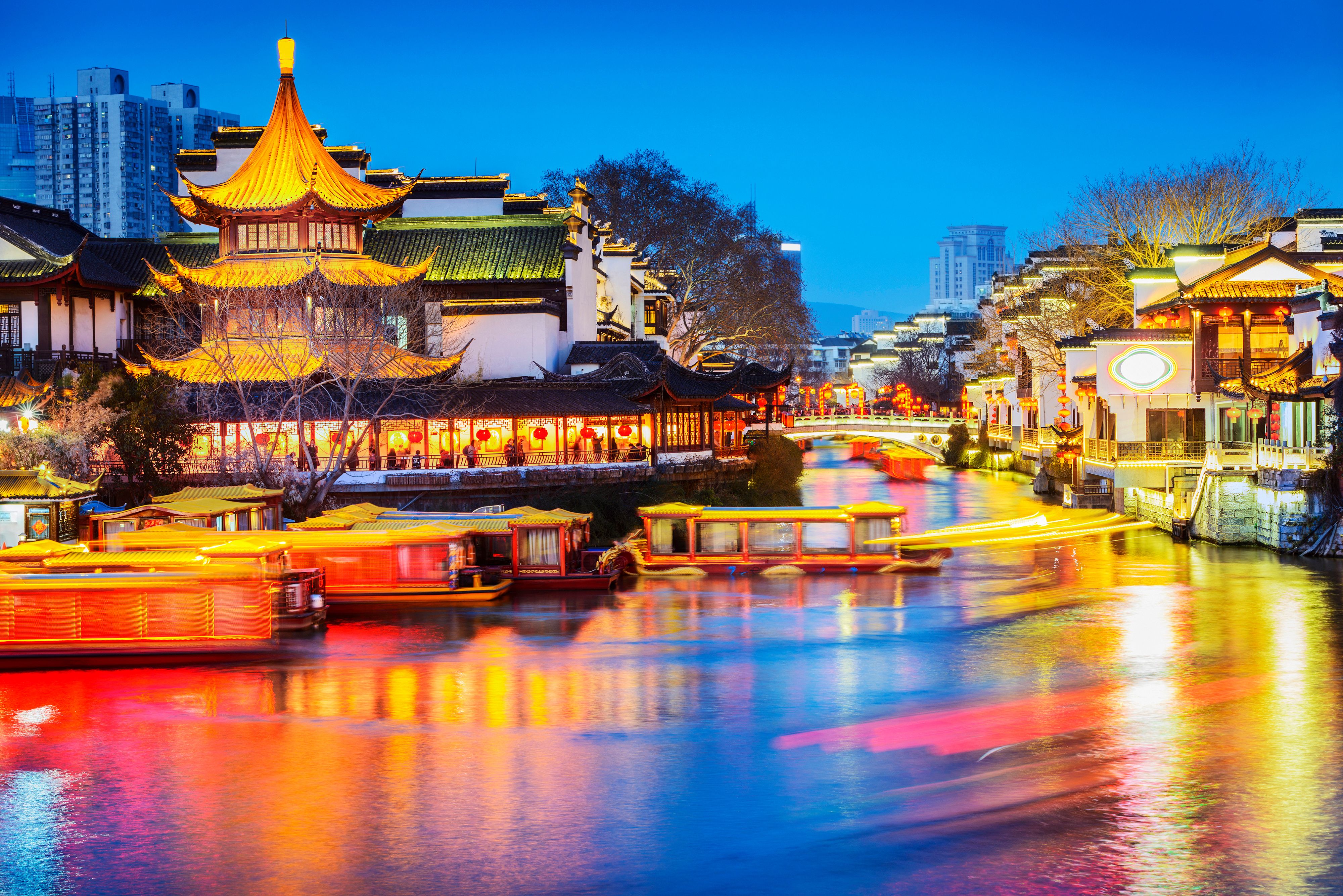 Nanjing Confucius Temple scenic region and Qinhuai River. People are visiting. Located in Nanjing, Jiangsu, China. | Image Credit: © aphotostory - stock.adobe.com.  