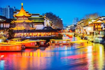 Nanjing Confucius Temple scenic region and Qinhuai River. People are visiting. Located in Nanjing, Jiangsu, China. | Image Credit: © aphotostory - stock.adobe.com.