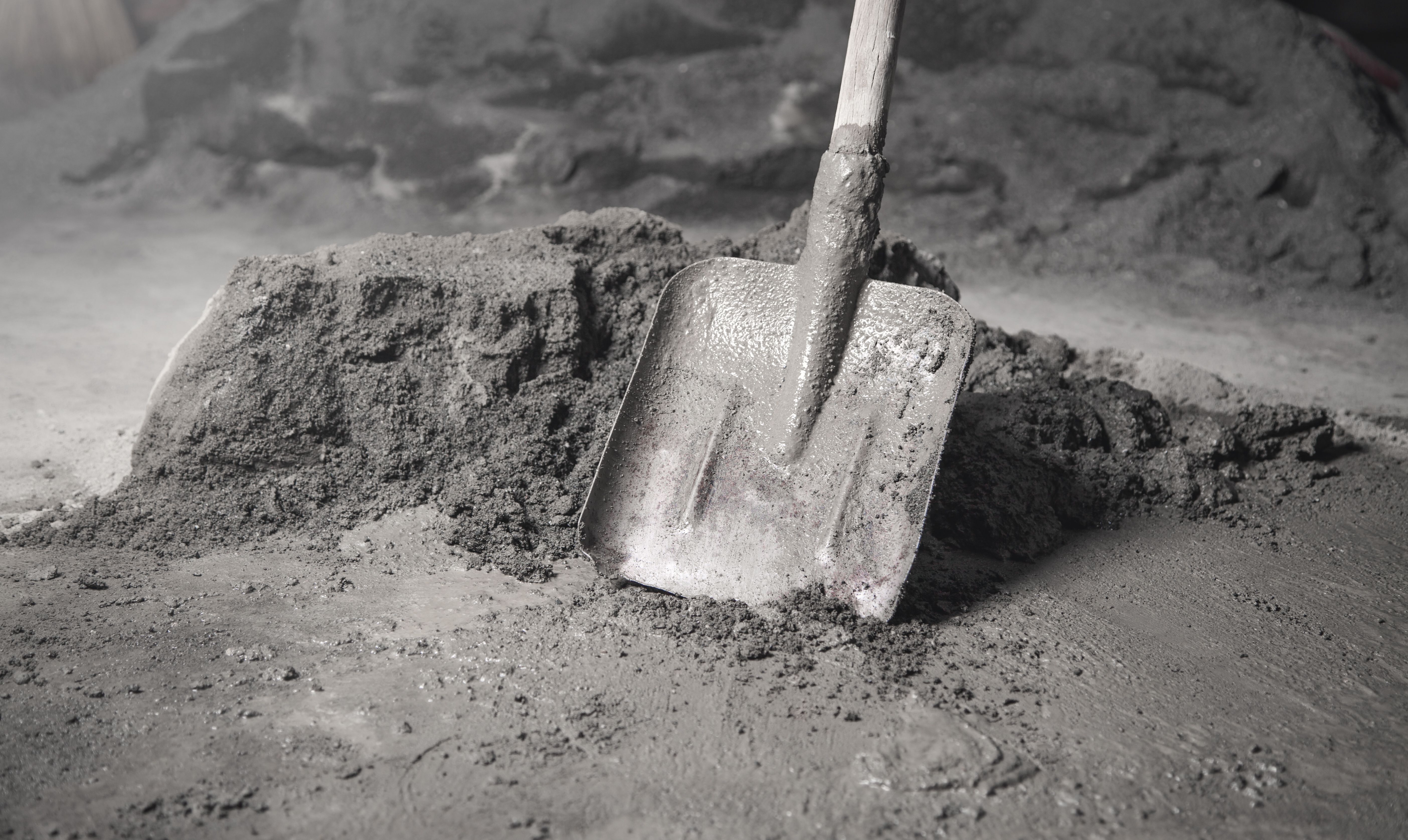 Shovel with a cement. Renovation, Work, Apartment | Image Credit: © andranik123 - stock.adobe.com