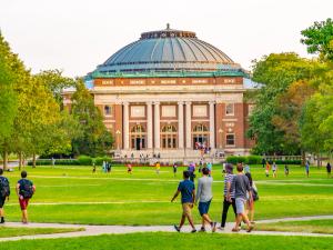 College students walk on the quad lawn of the University of Illinois campus in Urbana, Illinois | Image Credit: © Leigh Trail - stock.adobe.com