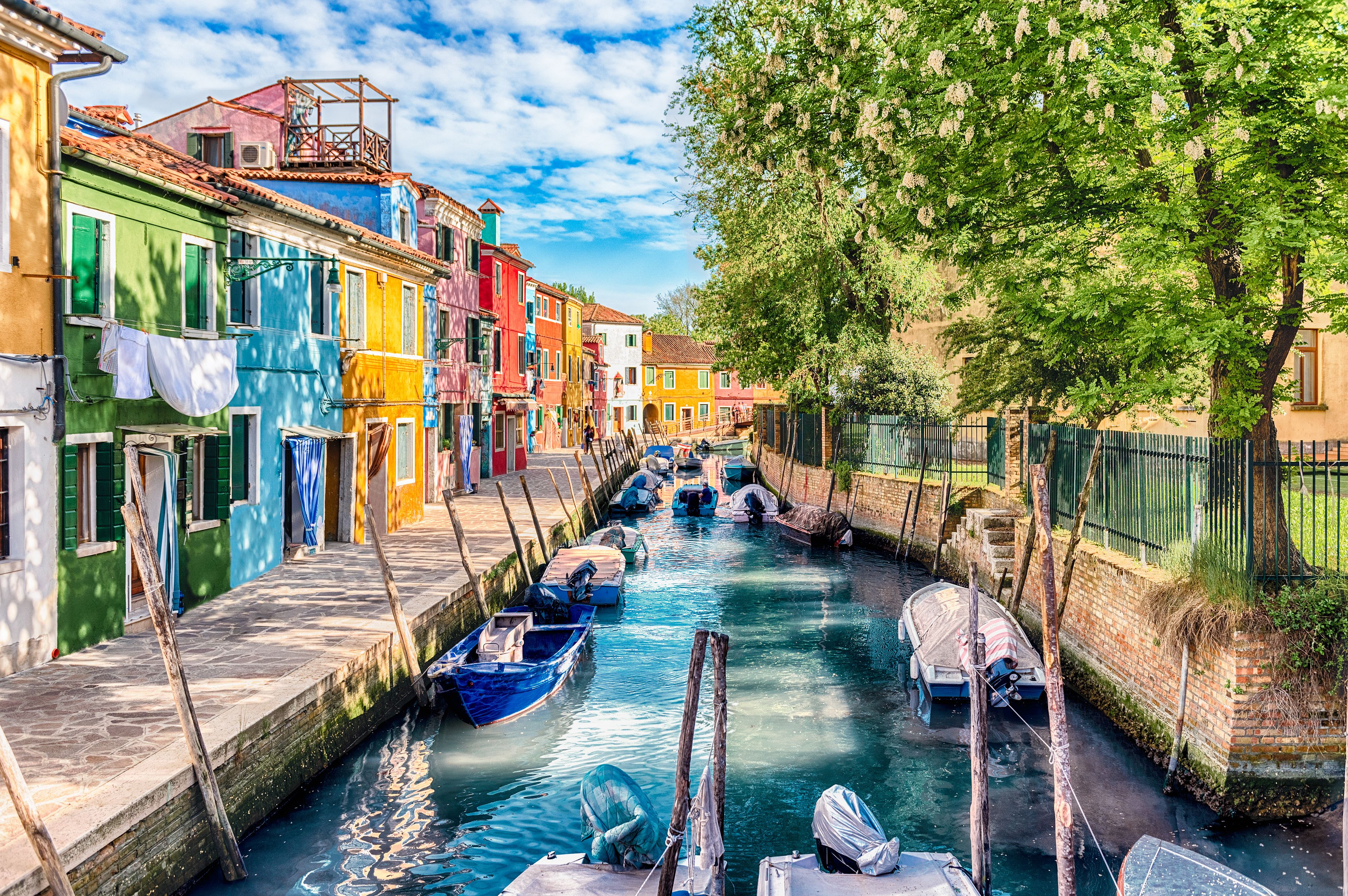 Colorful houses along the canal, island of Burano, Venice, Italy | Image Credit: © marcorubino - stock.adobe.com