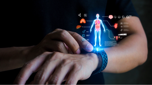 Futuristic health tech. A smartwatch projects a holographic health dashboard. Holographic icon user interface. © woravut -chronicles-stock.adobe.com