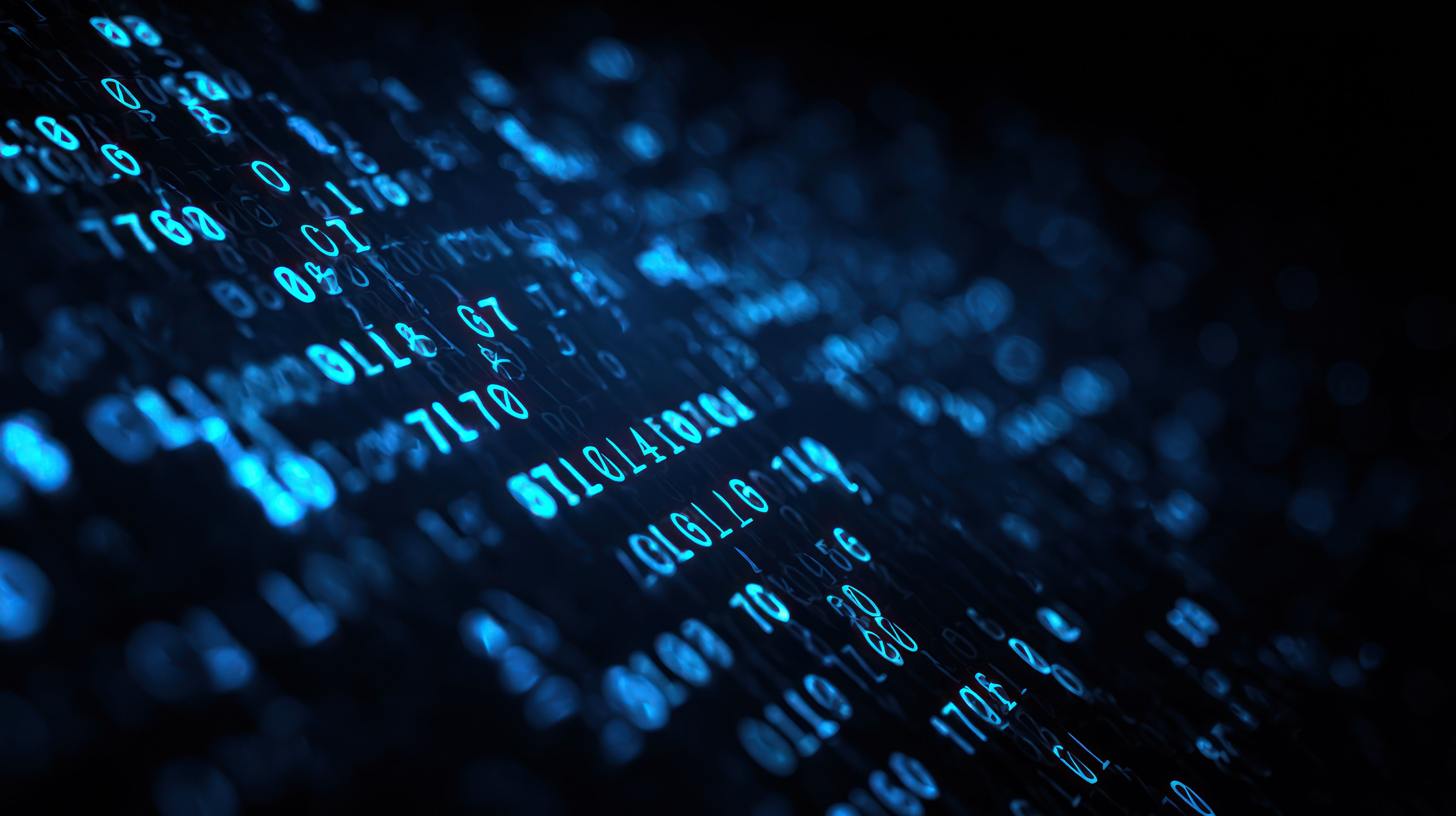 Abstract blue glowing binary code flowing diagonally on a dark background. Generated with AI. | Image Credit: © fyn - stock.adobe.com