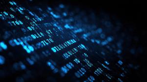 Abstract blue glowing binary code flowing diagonally on a dark background. Generated with AI. | Image Credit: © fyn - stock.adobe.com