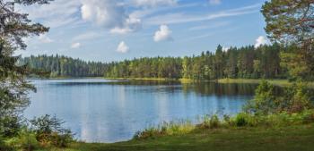 Panoramic view of beautiful forest lake in Russia. | Image Credit: © - stock.adobe.com.
