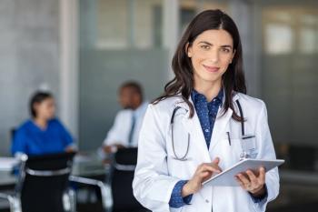 Doctor holding digital tablet at meeting room | Image Credit: © Rido - stock.adobe.com.
