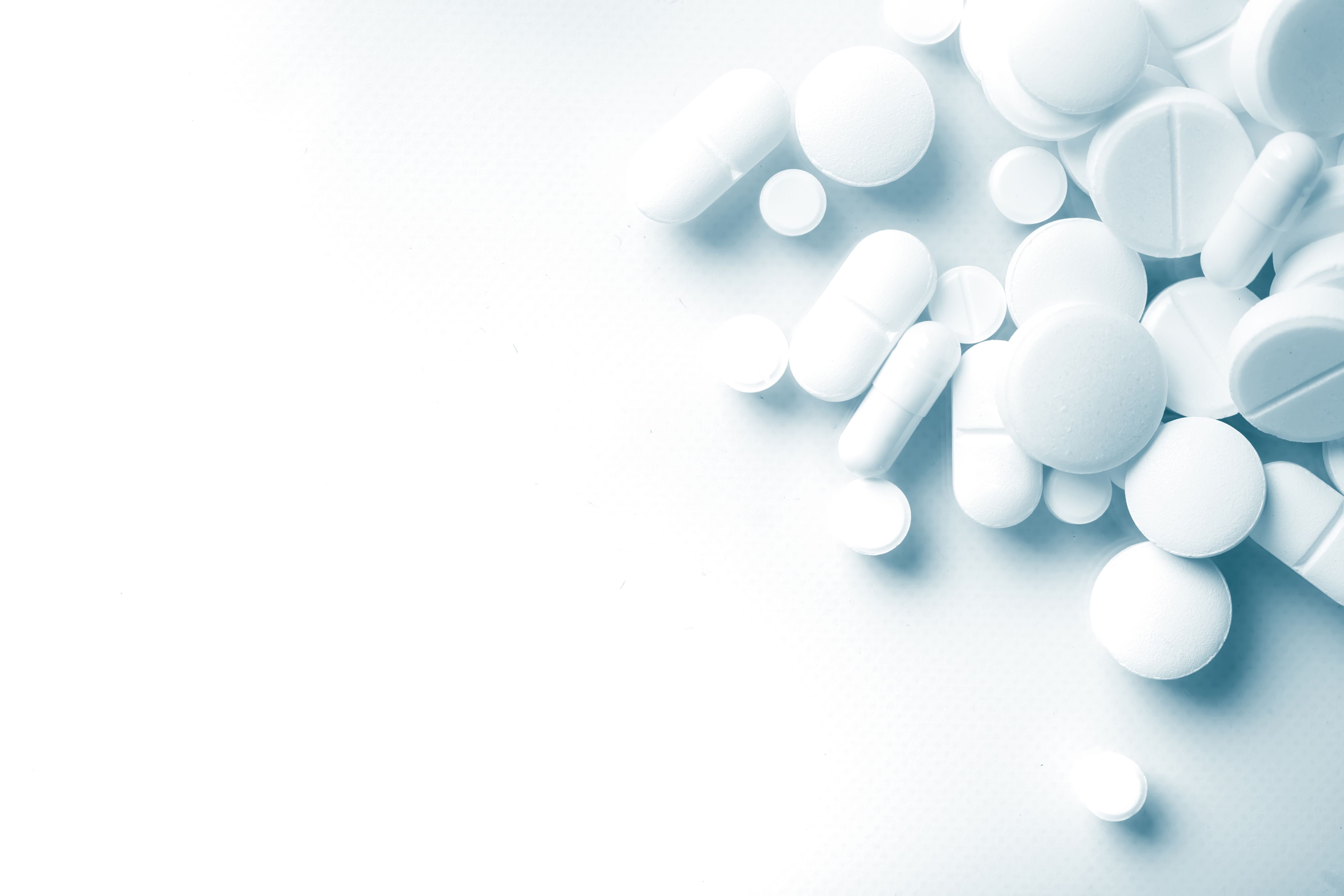 Pharmacy theme, white medicine tablets antibiotic pills. | Image Credit: © zadorozhna - stock.adobe.com