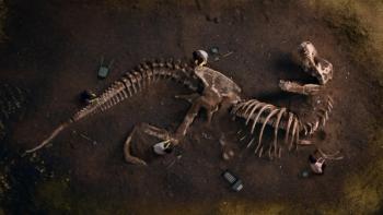 Realistic dinosaur fossil buried in the dirt ground. Generated by AI. | Image Credit: © OpenAI - ChatGPT.com