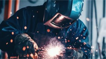 A welder in protective gear fuses aluminum pieces with precision, © 69-chronicles-stock.adobe.com