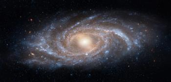 View from space to a spiral galaxy and stars. Universe filled with stars, nebula and galaxy. Elements of this image furnished by NASA. Image Credit: © Tryfonov - stock.adobe.com