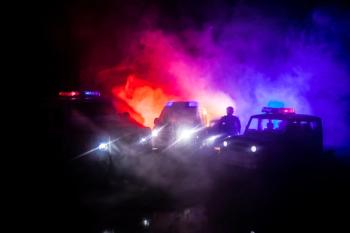 Police cars at night. Police car chasing a car at night with fog background. 911 Emergency response. Selective focus. | Image Credit: © zef art - stock.adobe.com