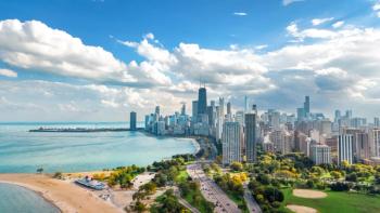 Chicago skyline aerial drone view from above, Lake Michigan and city of Chicago downtown skyscrapers cityscape bird's view from Lincoln park, Illinois, USA | Image Credit: © Iuliia Sokolovska - stock.adobe.com