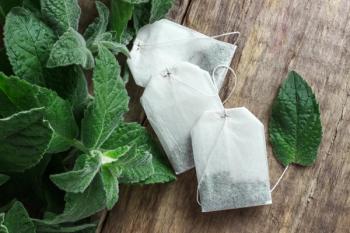 White tea bags with mint leaves | Image Credit: © Sklyarov - stock.adobe.com