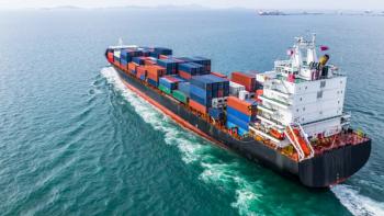 Aerial view cargo container ship sailing, container cargo ship in import export and business logistic and transportation of international by container ship, view from above business background | Image Credit: © Kalyakan - stock.adobe.com