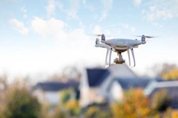 Drone flying front of home | Image Credit: © Ruslan Ivantsov - stock.adobe.com