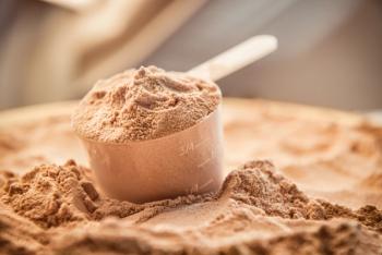 Whey protein scoop. Sports nutrition. | Image Credit: © Nick Starichenko - stock.adobe.com