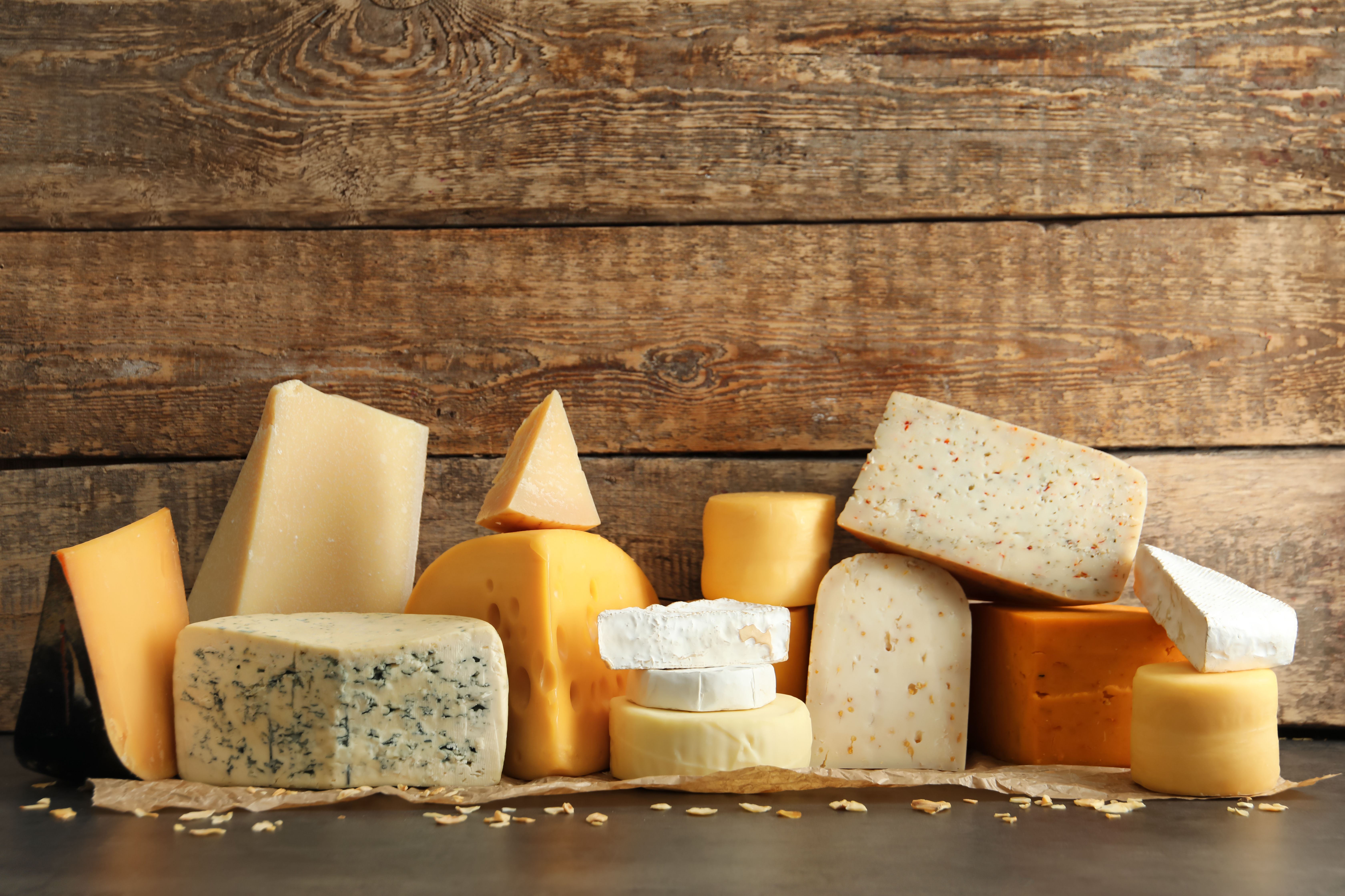 Different kinds of delicious cheese on table | Image Credit: © Africa Studio - stock.adobe.com.